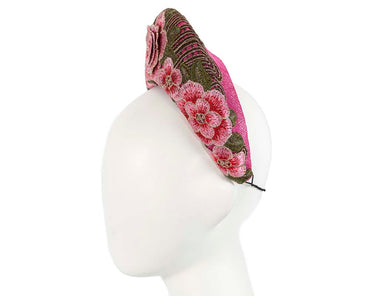 Exclusive fuchsia headband by Cupids Millinery
