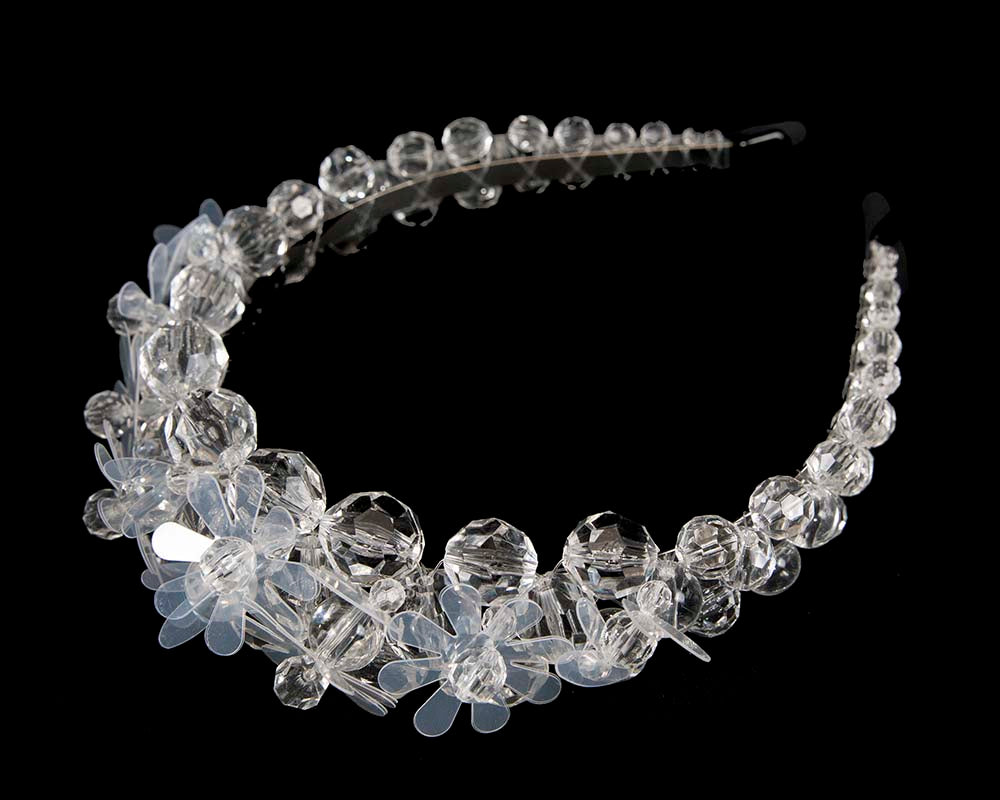 White designers headband by Max Alexander