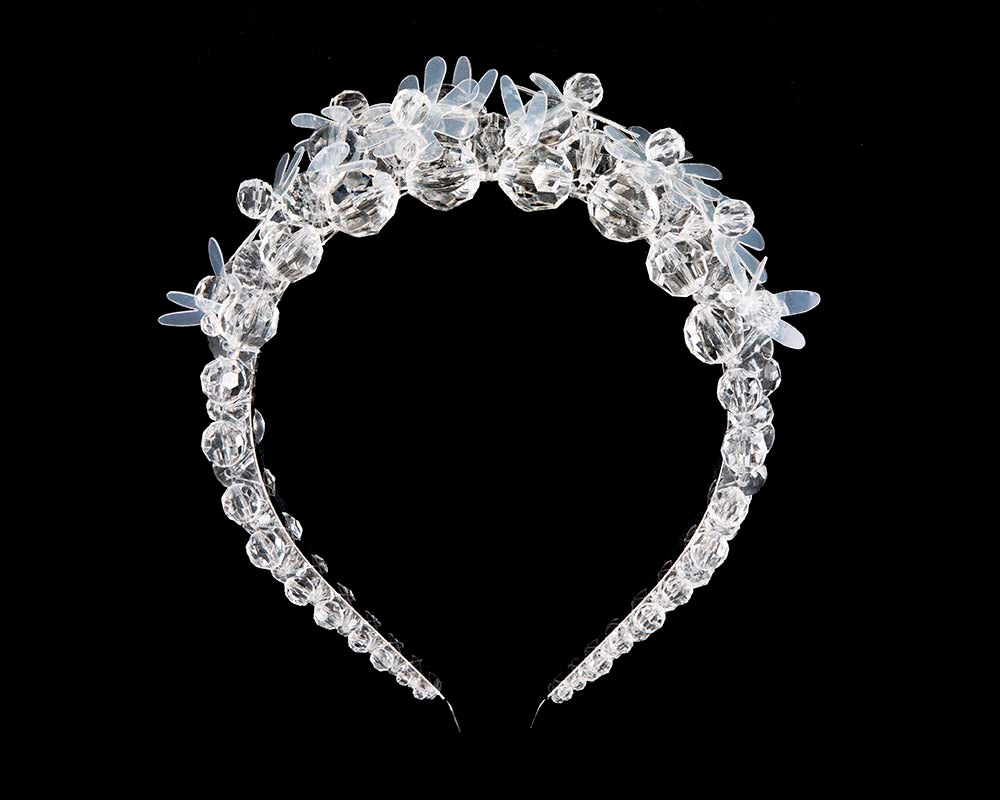 White designers headband by Max Alexander