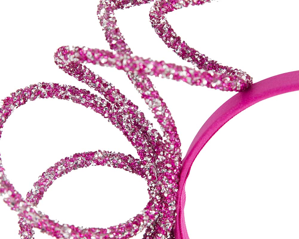 Bespoke sculptured fuchsia fascinator by Cupids Millinery