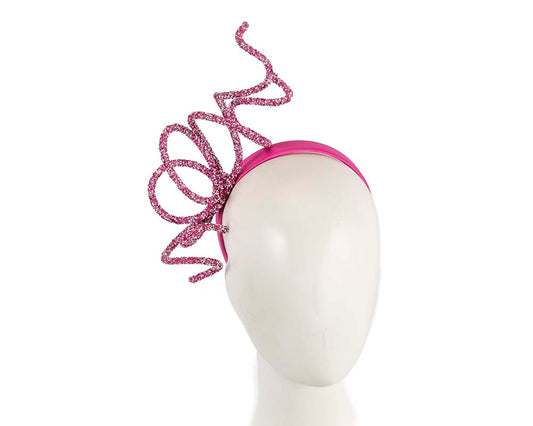Bespoke sculptured fuchsia fascinator by Cupids Millinery