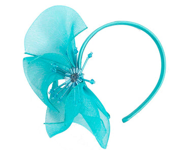 Bespoke turquoise flower headband by Cupids Millinery