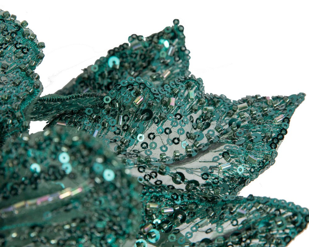 Shiny teal green lace fascinator by Cupids Millinery