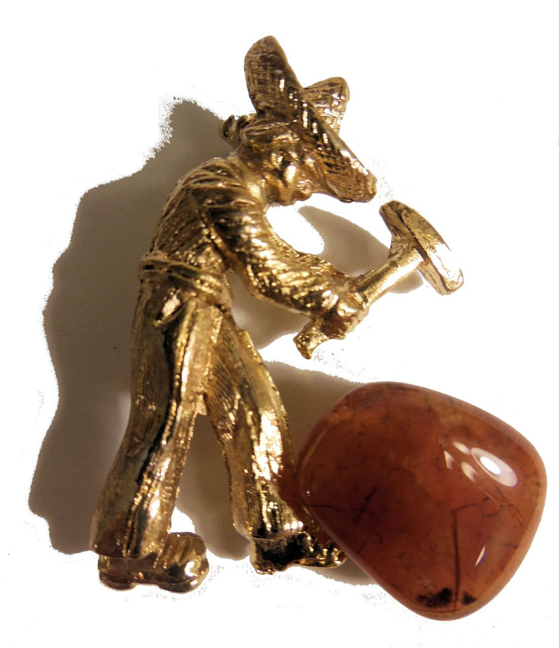 Vintage brooch. At work in the quarry hammering gemstones