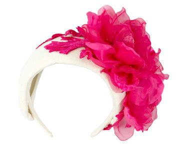 Wide cream headband with fuchsia silk flower