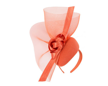 Tall orange winter racing fascinator by Fillies Collection