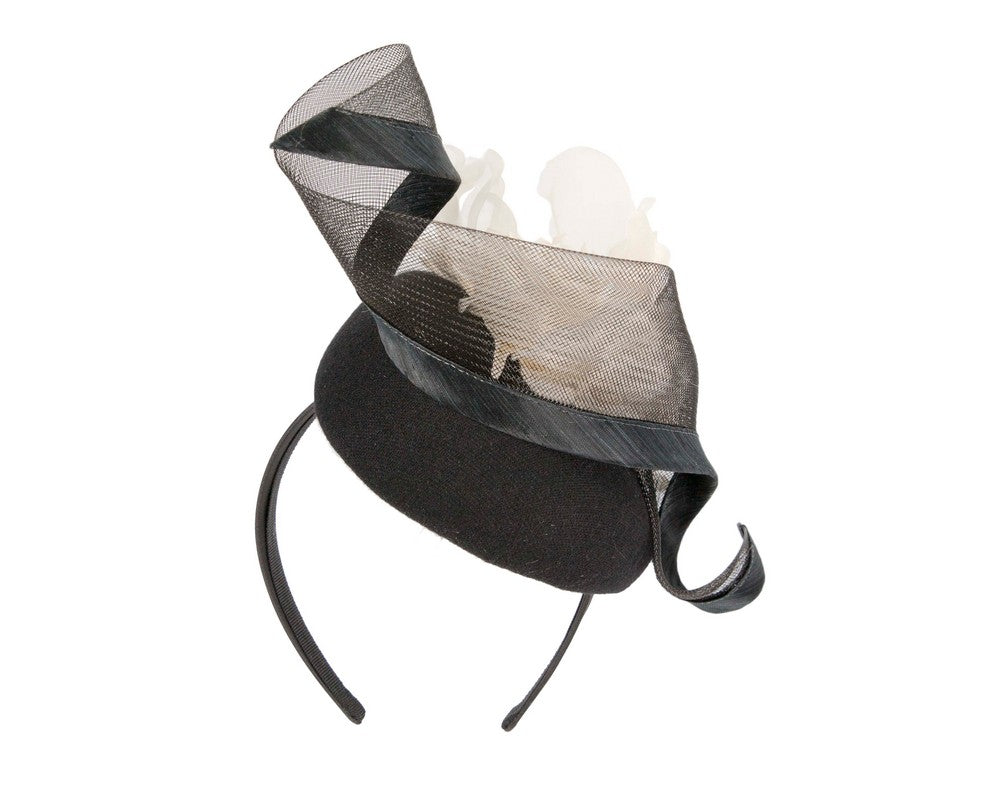 Black winter pillbox fascinator with white flower