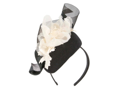 Black winter pillbox fascinator with white flower