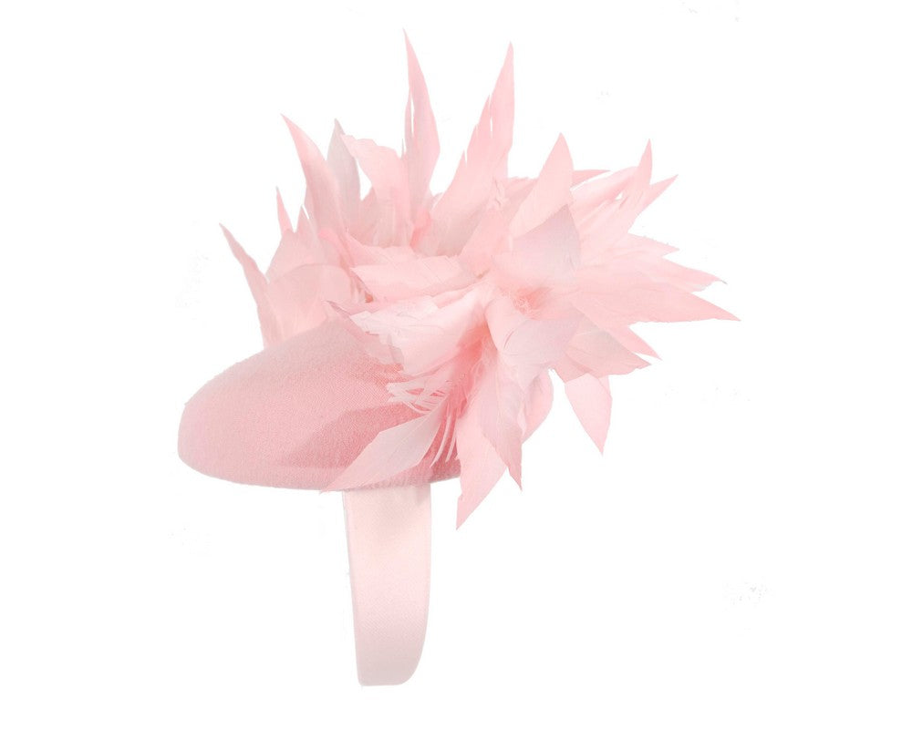 Pink feather winter facing fascinator