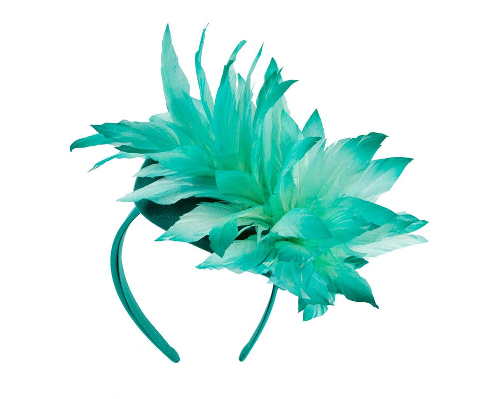 Teal feather winter facing fascinator