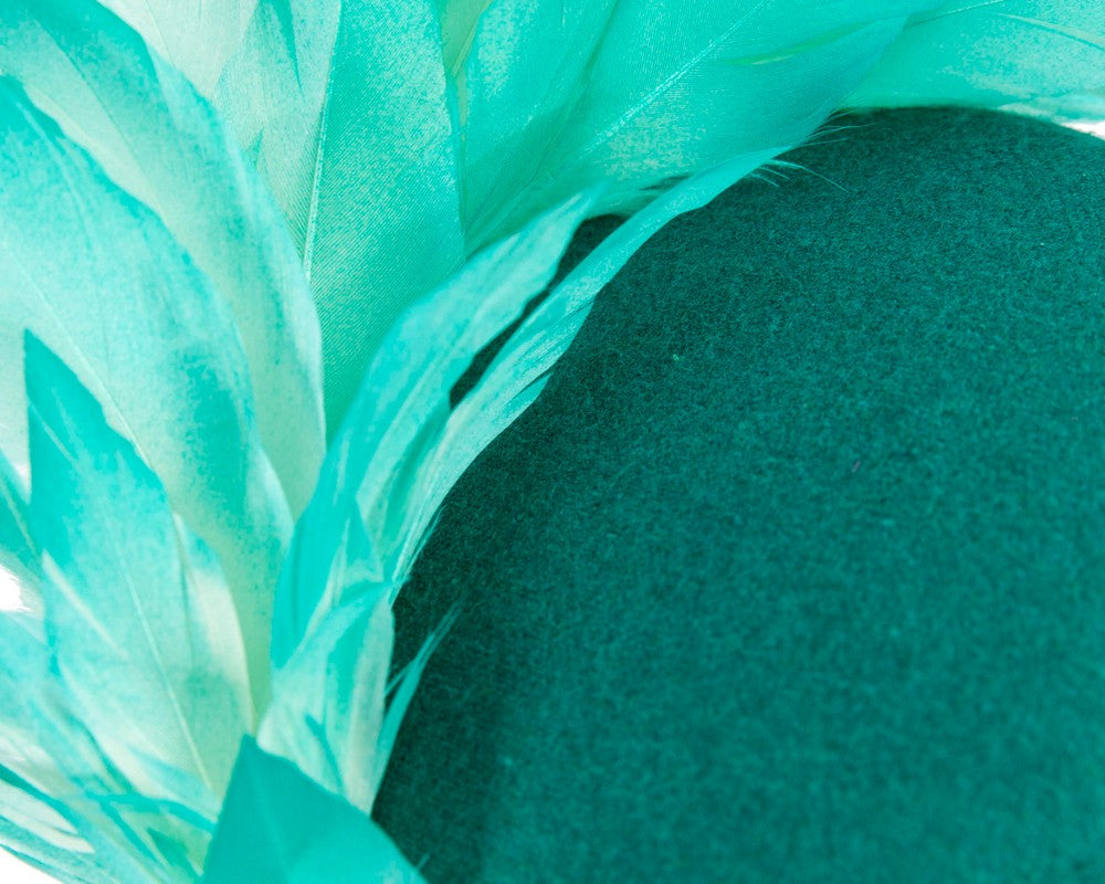 Teal feather winter facing fascinator
