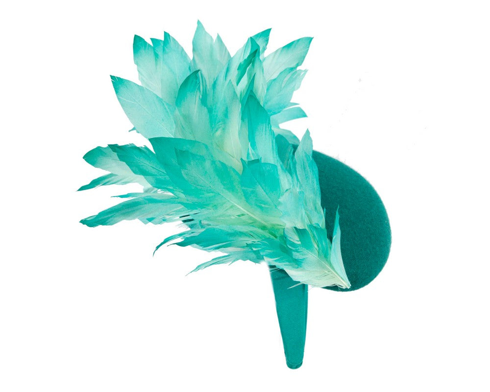 Teal feather winter facing fascinator