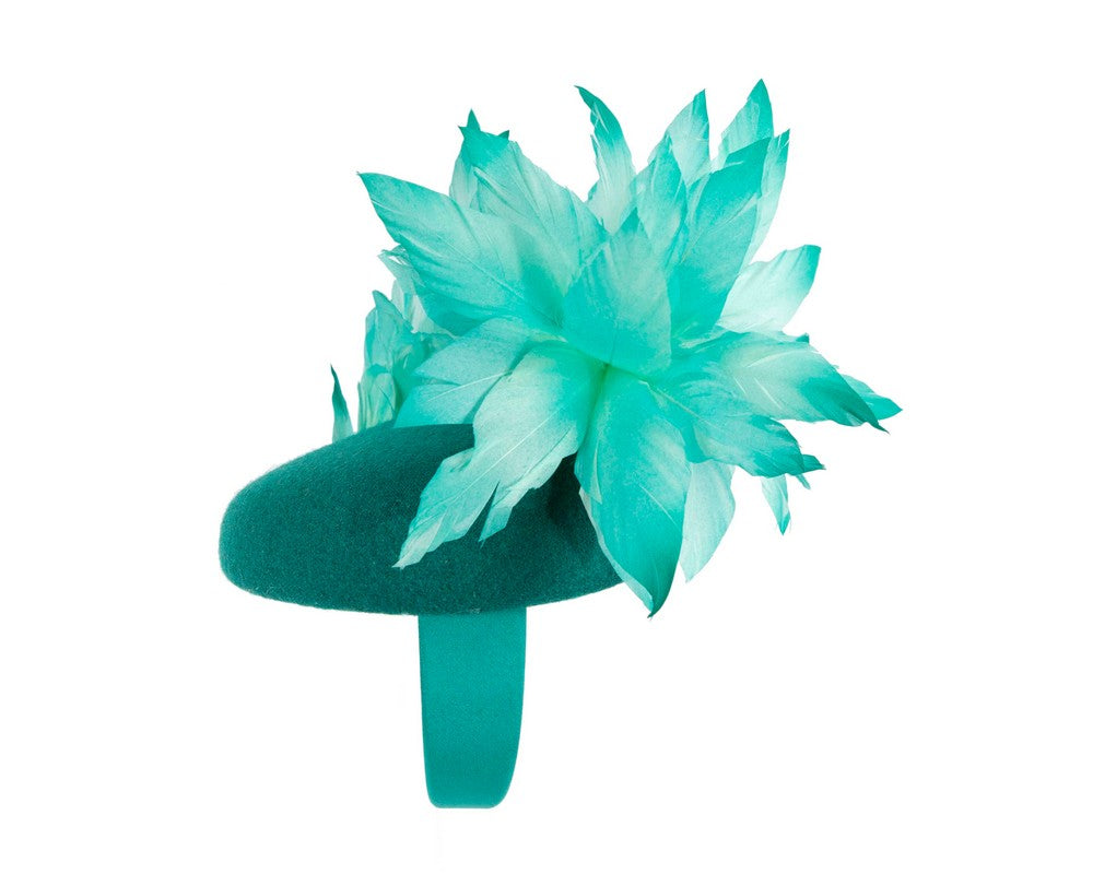 Teal feather winter facing fascinator