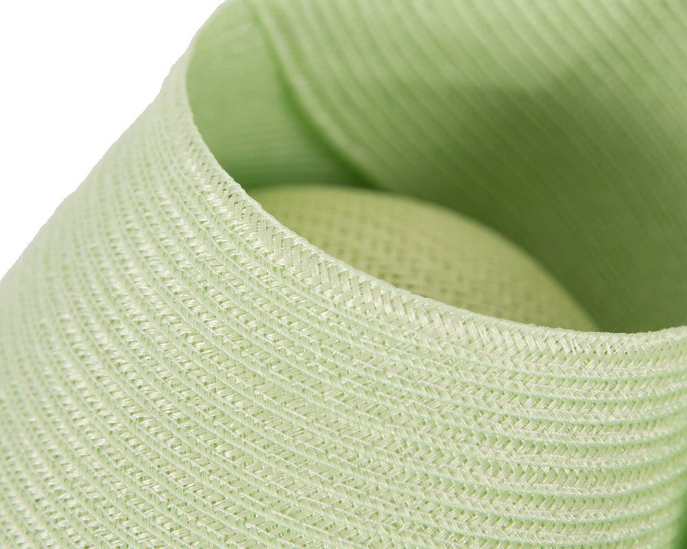 Modern lime fascinator by Max Alexander