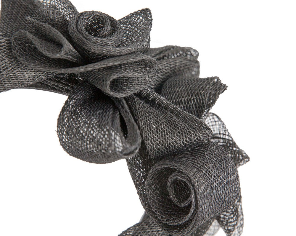 Black curly sinamay fascinator by Max Alexander