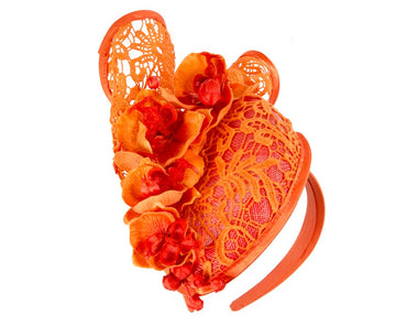 Orange lace covered pillbox fascinator