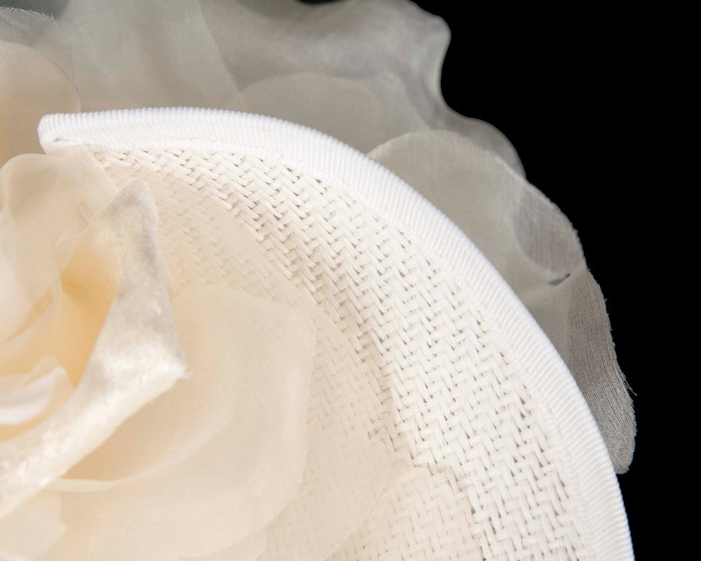 Exclusive white fascinator with flower by Fillies Collection