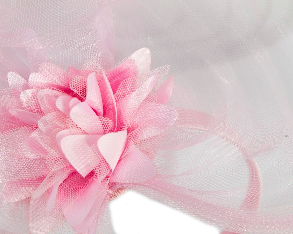 Pink crinoline and flower fascinator