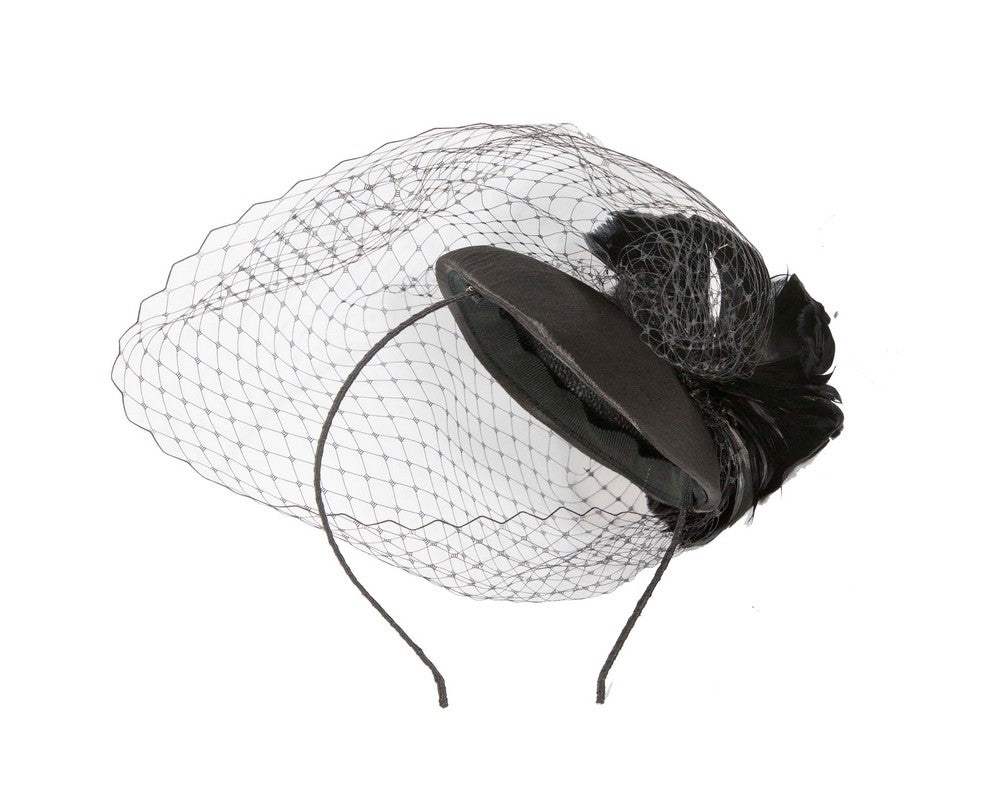 Black fascinator with feather and veil