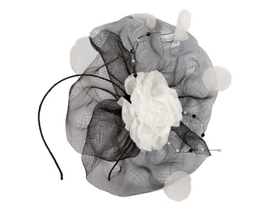Large black fascinator with white flower