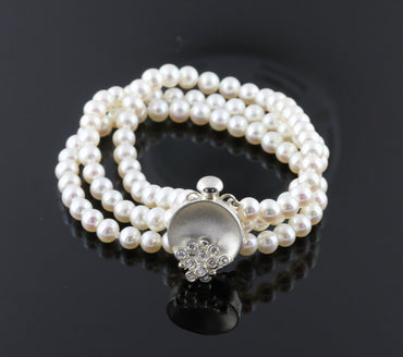 Bowl of Overflowing Diamonds on pearls-Bracelet- Sterling silver