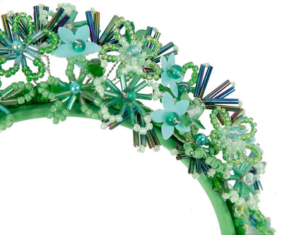 Bespoke green designers fascinator headband by Cupids Millinery