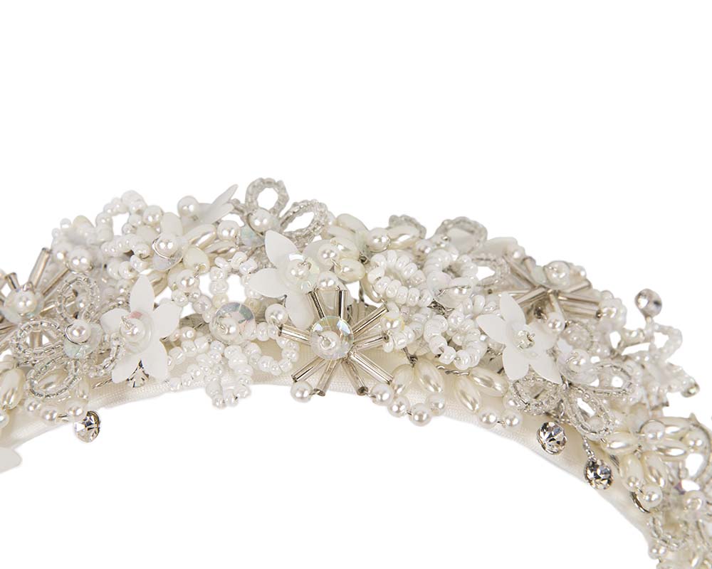 Bespoke ivory designers fascinator headband by Cupids Millinery