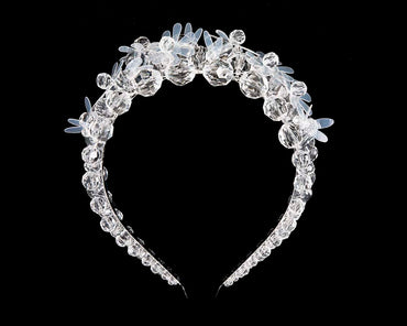 White designers headband by Max Alexander