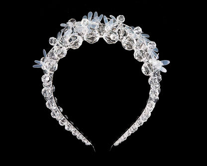 White designers headband by Max Alexander