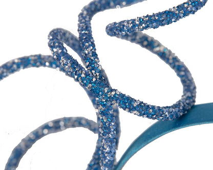 Bespoke sculptured blue fascinator by Cupids Millinery