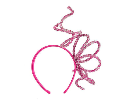 Bespoke sculptured fuchsia fascinator by Cupids Millinery
