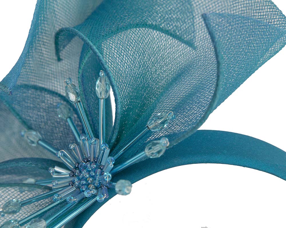 Bespoke blue flower headband by Cupids Millinery