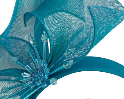 Bespoke blue flower headband by Cupids Millinery