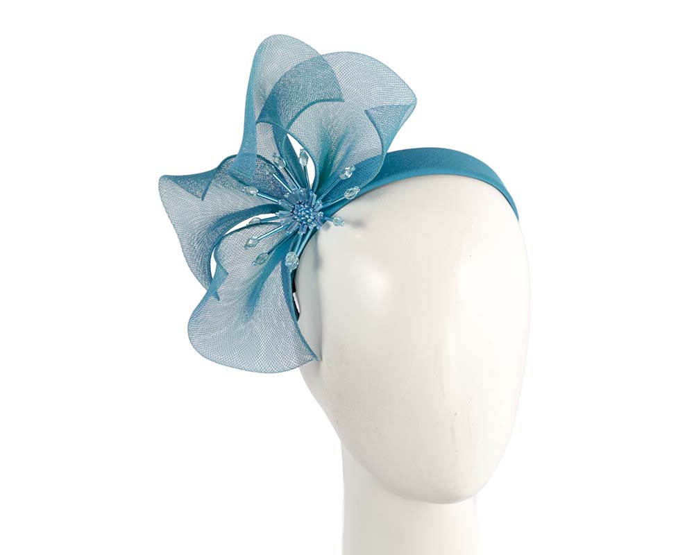 Bespoke blue flower headband by Cupids Millinery