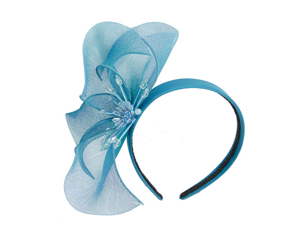 Bespoke blue flower headband by Cupids Millinery
