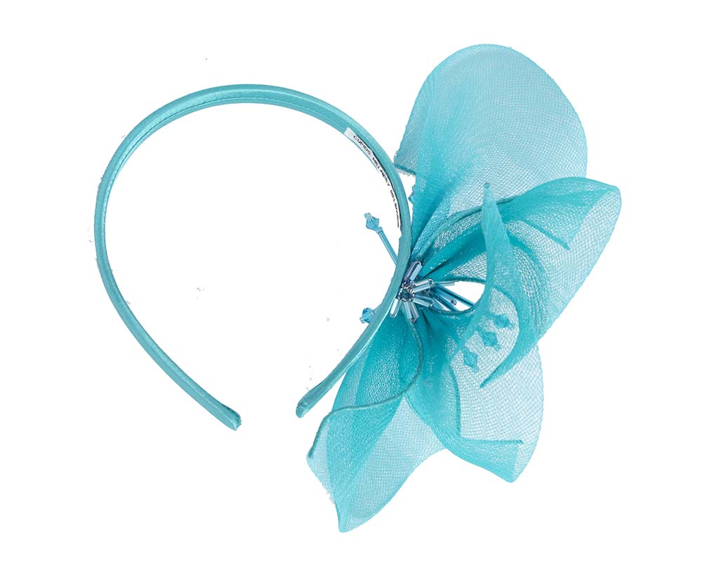 Bespoke turquoise flower headband by Cupids Millinery