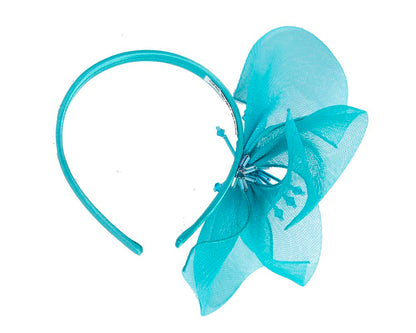 Bespoke turquoise flower headband by Cupids Millinery
