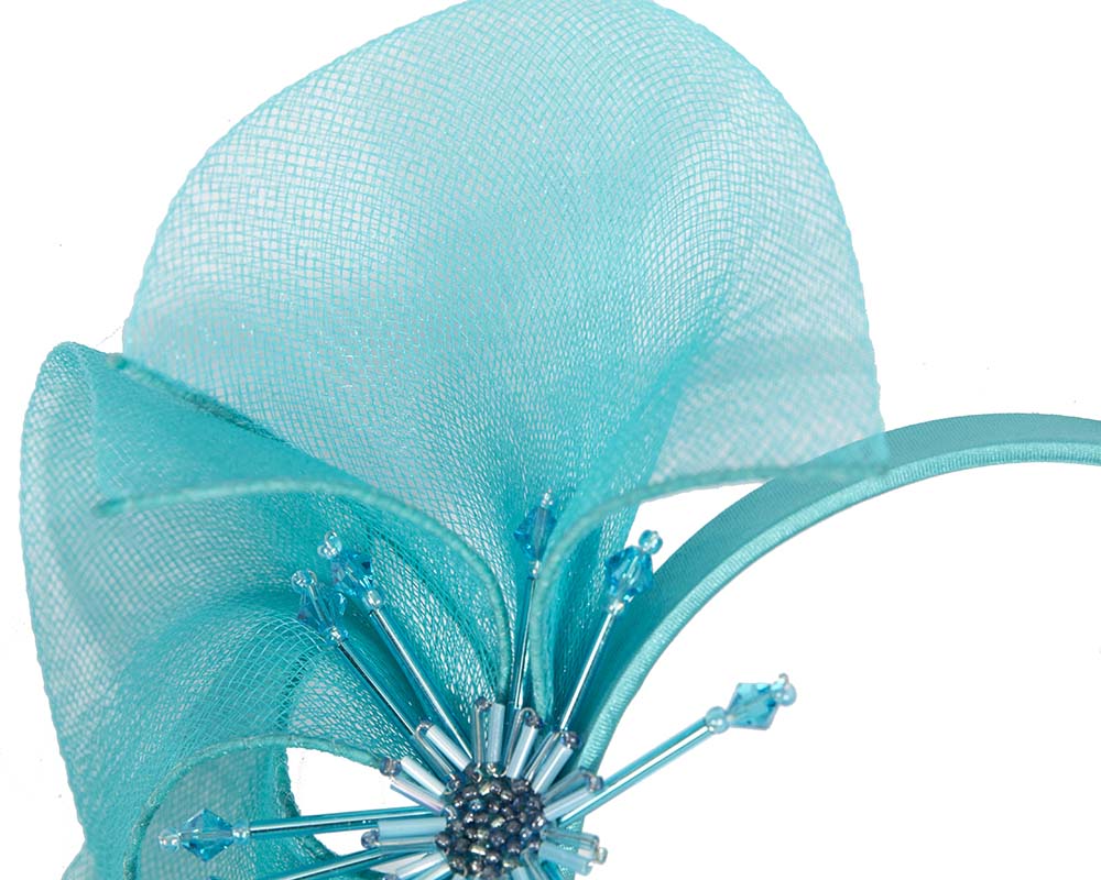 Bespoke turquoise flower headband by Cupids Millinery
