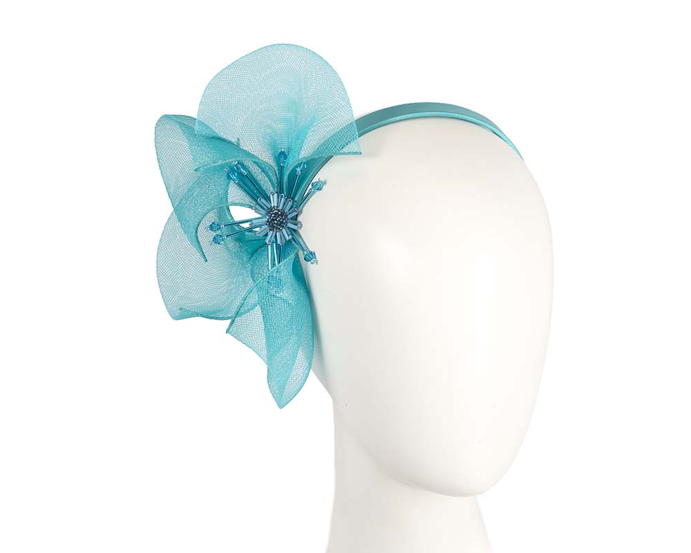 Bespoke turquoise flower headband by Cupids Millinery