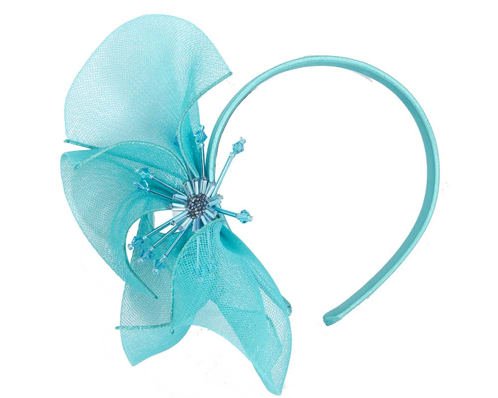 Bespoke turquoise flower headband by Cupids Millinery