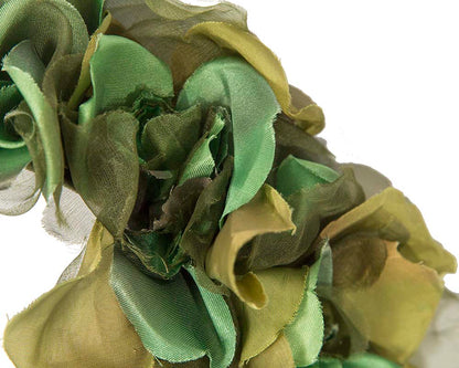 Green flower headband fascinator by Cupids Millinery
