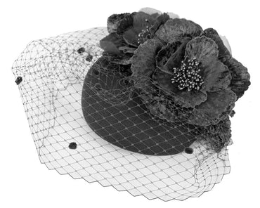 Black winter racing felt pillbox with flower and veiling by Fillies Collection