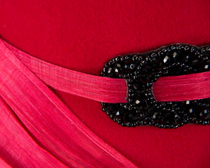 Red felt draped cloche hat