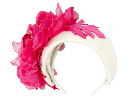 Wide cream headband with fuchsia silk flower