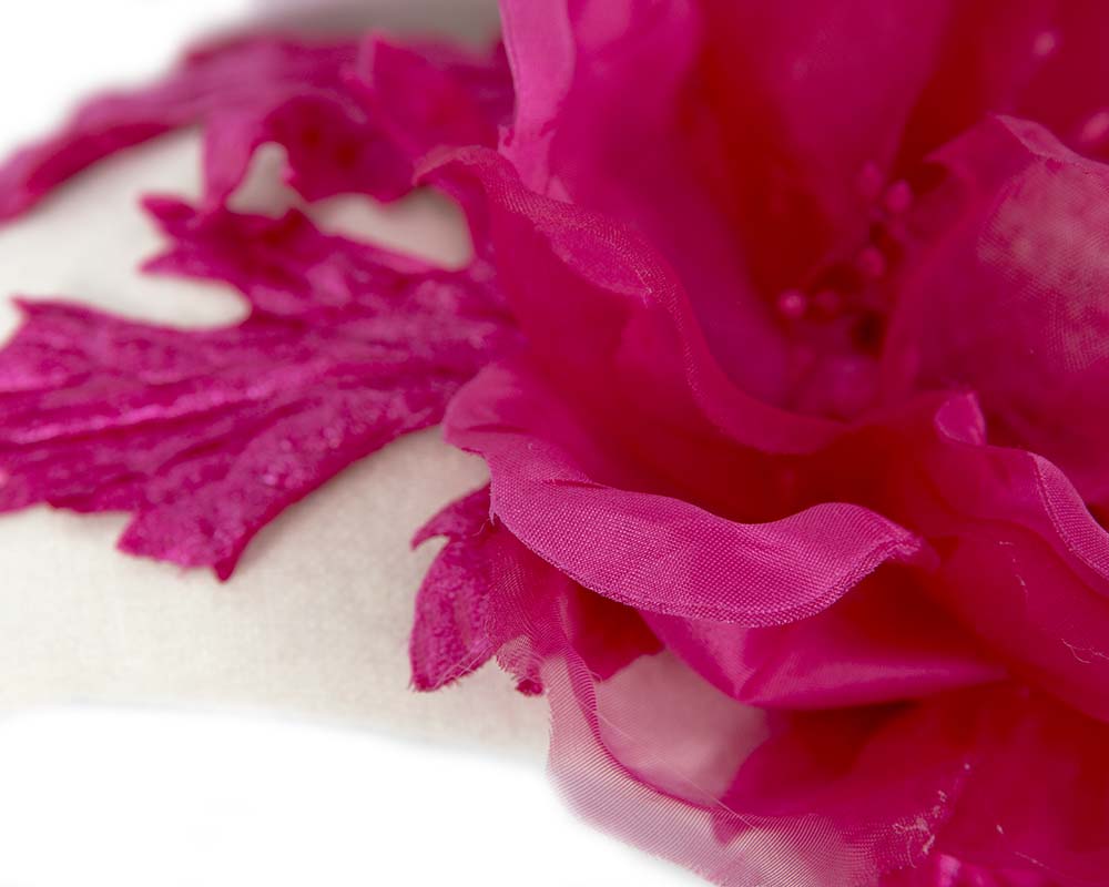 Wide cream headband with fuchsia silk flower