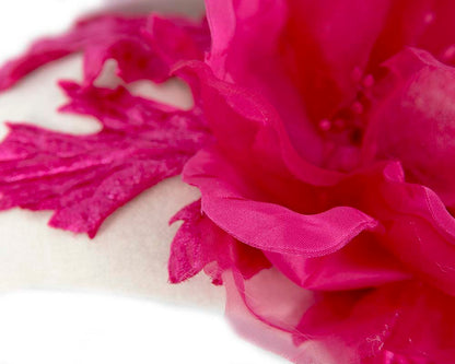 Wide cream headband with fuchsia silk flower