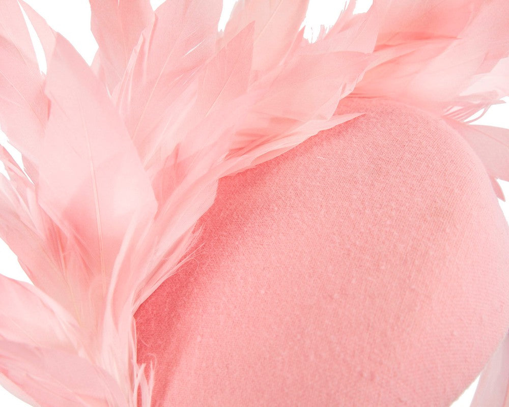 Pink feather winter facing fascinator