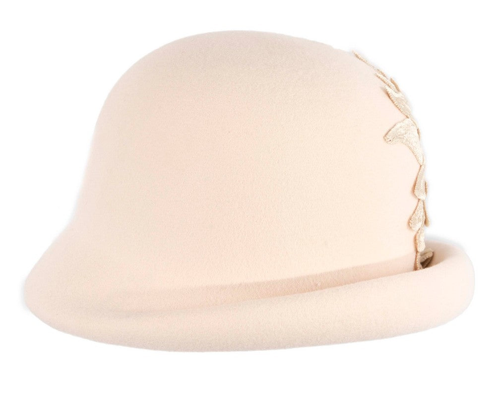 Beige winter fashion hat by Max Alexander