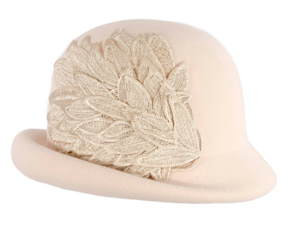 Beige winter fashion hat by Max Alexander
