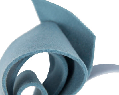 Petrol blue felt bow fascinator by Max Alexander